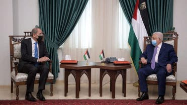 Palestinian President Mahmud Abbas (R) meeting with Jordan’s Foreign Minister Ayman Safadi in Ramallah, April 21, 2021. (Jordanian Foreign Ministry/AFP)