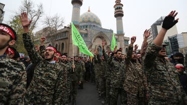Iranian revolutionary guards take part in an anti-US rally to protest the killings during a US air stike of Iranian military commander Qasem Soleimani and Iraqi paramilitary chief Abu Mahdi al-Muhandis, in the capital Tehran on January 4, 2020. Soleimani, the 62-year-old deputy commander of the Revolutionary Guards, will be laid to rest next week in his hometown of Kerman as part of three days of ceremonies across the country, the Revolutionary Guards said.