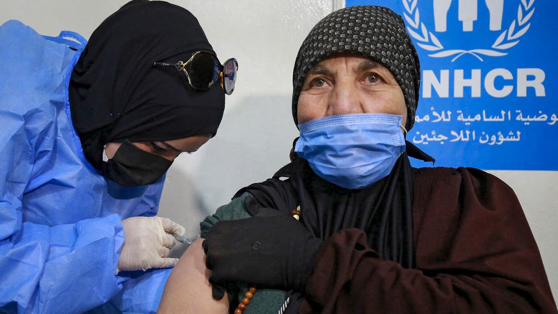 A Syrian refugee receives the Coronavirus vaccine, at a medical center in the Zaatari refugee camp, 80 kilometers (50 miles) north of the Jordanian capital Amman on February 15, 2021. (File photo: AFP)
