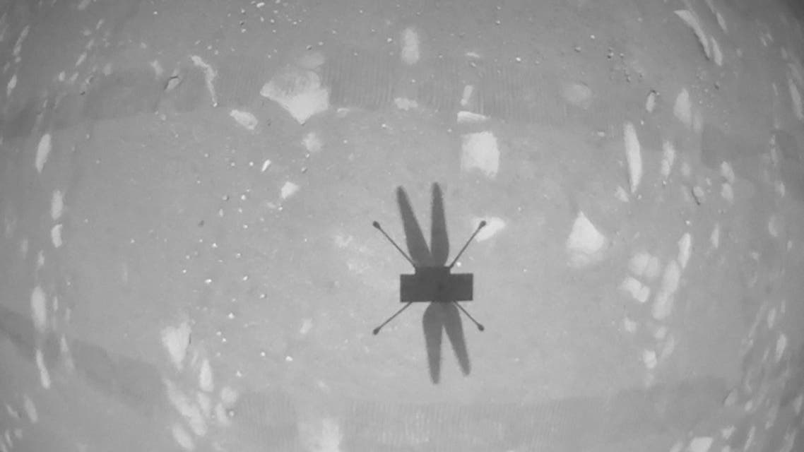 The shadow of NASA's Mars helicopter Ingenuity is seen during its second flight, captured by its black-and-white navigation camera on April 22, 2021. (Reuters)