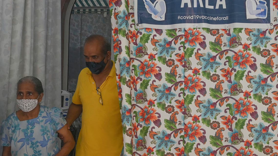 People walk out of a vaccination area, at the Saifee Hospital in Mumbai on April 12, 2021. (File photo: AFP)