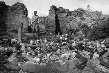 A picture released by the Armenian Genocide Museum-Institute dated 1915 purportedly shows soldiers standing over skulls of victims from the Armenian village of Sheyxalan in the Mush valley, on the Caucasus front during the First World War. Armenians say up to 1.5 million of their forebears were killed in a 1915-16 genocide by Turkey's former Ottoman Empire. Turkey says 500,000 died and ascribes the toll to fighting and starvation during World War I. (AFP)