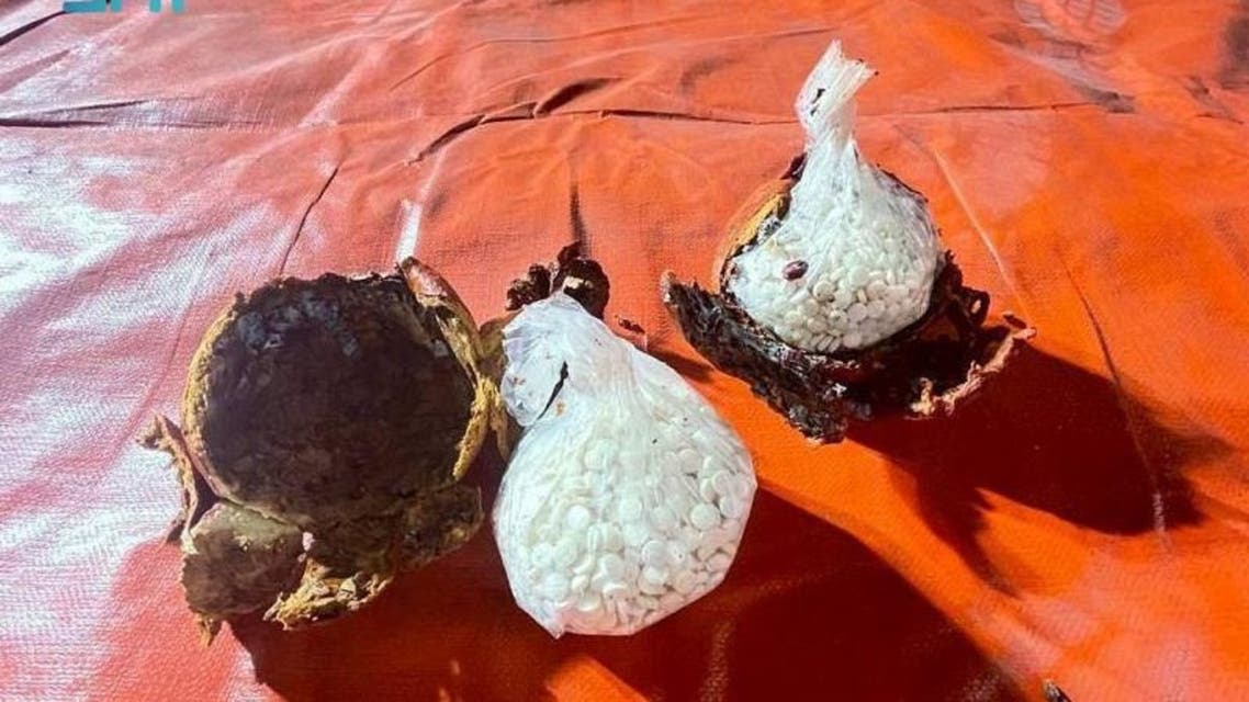 amphetamine narcotics tablets smuggled through pomegranate shipment coming from Lebanon is seized in Saudi Arabia on Friday April 23, 2021. (SPA)