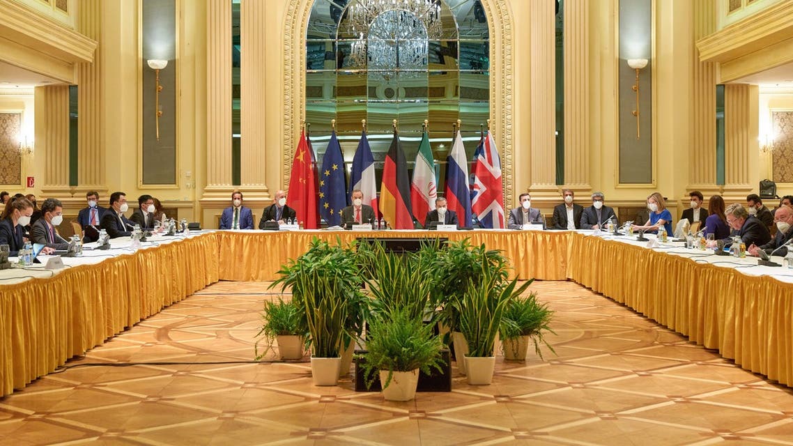 This handout photo taken and released by the EU Delegation in Vienna on April 20, 2021 shows delegation members from the parties to the Iran nuclear deal - Germany, France, Britain, China, Russia and Iran – attending a meeting at the Grand Hotel of Vienna as they try to restore the deal. (AFP)