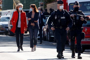 President of French Ile-de-France region Valerie Pecresse walks towards members of the media at the cordoned-off area where an attacker stabbed a female police administrative worker, in Rambouillet, near Paris, France, on April 23, 2021. (Reuters)