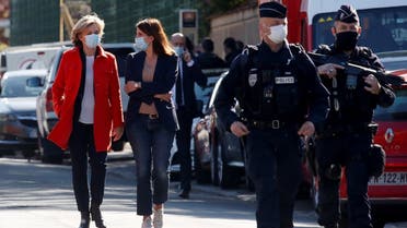 President of French Ile-de-France region Valerie Pecresse walks towards members of the media at the cordoned-off area where an attacker stabbed a female police administrative worker, in Rambouillet, near Paris, France, on April 23, 2021. (Reuters)