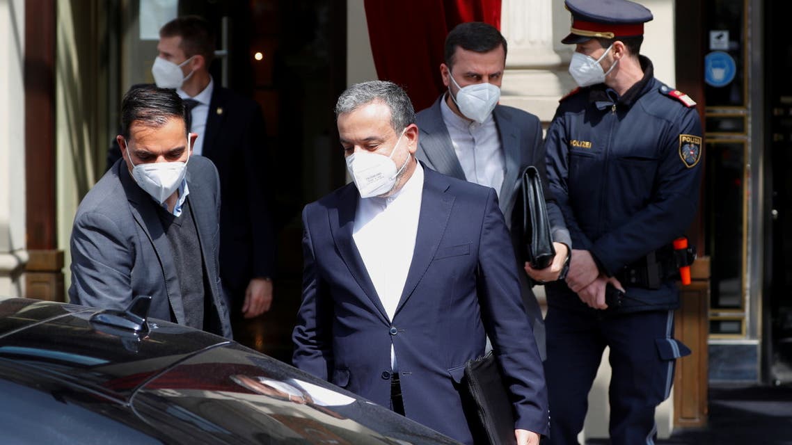 Iranian Deputy at the Ministry of Foreign Affairs Abbas Araghchi and Iran's ambassador to the U.N. nuclear watchdog Kazem Gharibabadi leave a hotel, in Vienna, Austria, April 20, 2021. REUTERS/Leonhard Foeger