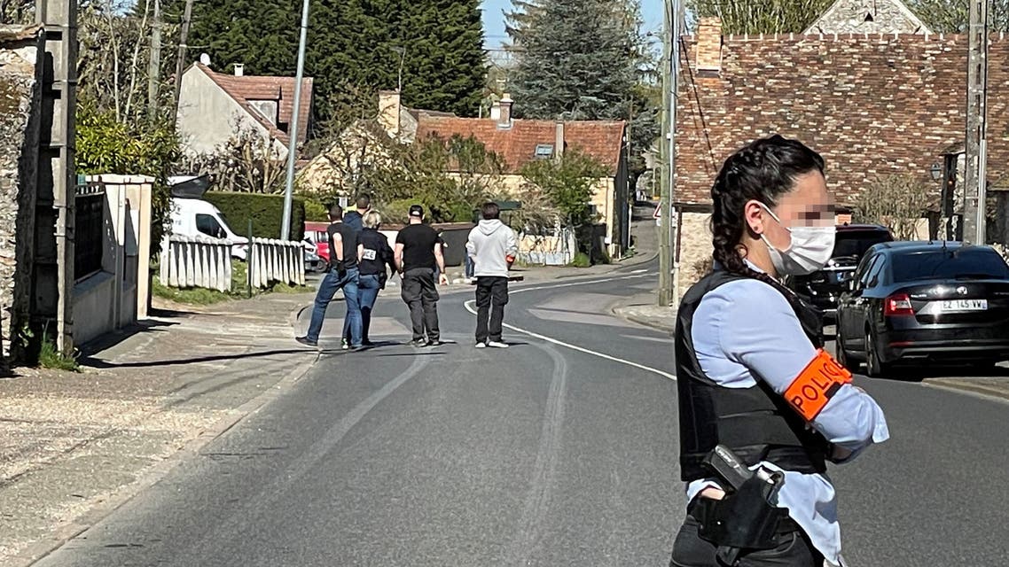 French police forces conduct a search at the house of a Tunisian man who stabbed to death a female police employee at a police station in Rambouillet, southwest of Paris, on April 23, 2021. (AFP)