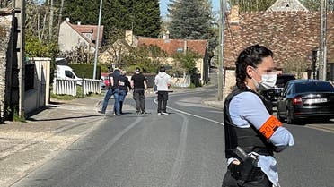 French police forces conduct a search at the house of a Tunisian man who stabbed to death a female police employee at a police station in Rambouillet, southwest of Paris, on April 23, 2021. (AFP)