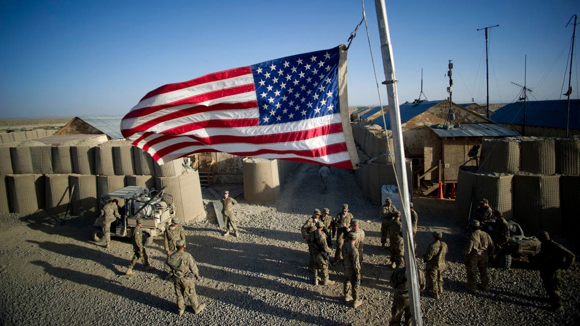 The American flag flies at half mast to remember the victims of 9/11 at Forward Operating Base (FOB) Kuschamond on September 11, 2011. (AFP)