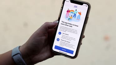 The coronavirus disease (COVID-19) contact tracing smartphone app of Britain's National Health Service (NHS) is displayed on an iPhone in this illustration photograph taken in Keele, Britain, September 24, 2020. (File photo: Reuters)