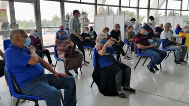 People wait at a coronavirus disease (COVID-19) vaccination centre in Tunis, Tunisia, April 26, 2021. Picture taken April 26, 2021. (File photo: Reuters)