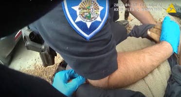 In this image taken from Alameda Police Department body camera video, Alameda Police Department officers pin 26-year-old Mario Gonzalez to the ground during an arrest, April 19, 2021, in Alameda, Calif. Gonzalez stopped breathing during the arrest and was pronounced dead at a hospital. (AP)