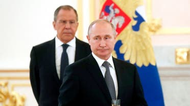Russian President Vladimir Putin (R) and Russian Foreign minister Sergei Lavrov attend the ceremony for the presentation of ambassador's credentials at the Kremlin in Moscow on July 3, 2019. (Reuters)