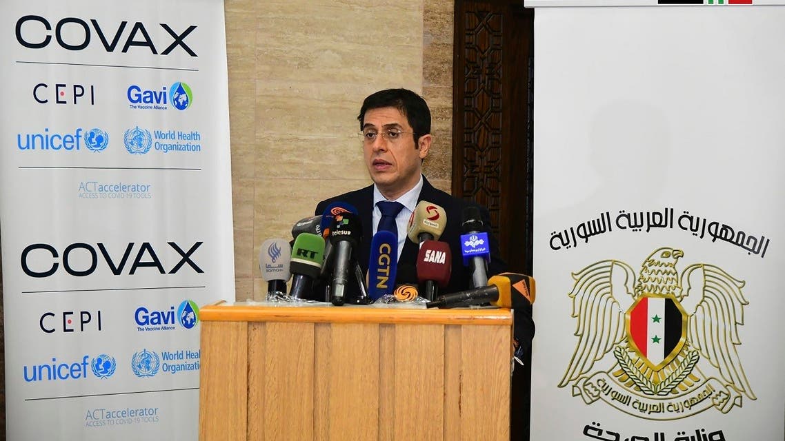 Syria's Health Minister Hassan Ghabbash, during a press conference where he announced receiving the first batch of AstraZeneca Covid-19 vaccines, in Damascus, Syria, on April 22, 2021. (AP)