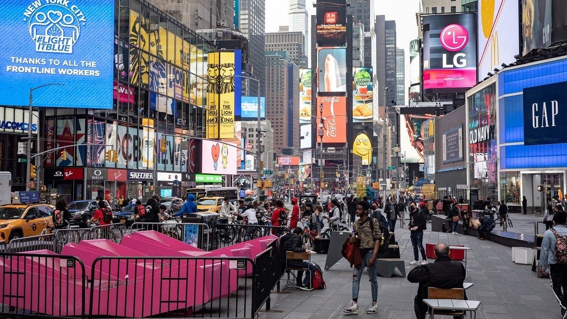 People wearing protective masks are seen in Times Square during the outbreak of the coronavirus in the Manhattan borough of New York City, New York, US, on March 25, 2021. (Reuters)
