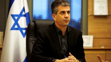 Israel's Eli Cohen, then economy minister, works at his office in the Knesset, the Israeli parliament, in Jerusalem Nov. 22, 2017. (File Photo: Reuters)