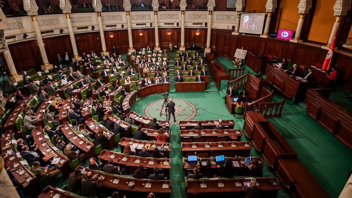 Tunisian lawmakers debate ahead of a confidence vote on the new government reshuffle by Prime Minister Hichem Michichi at the Tunisian Assembly (parliament) headquarters in the capital Tunis on January 26, 2021.