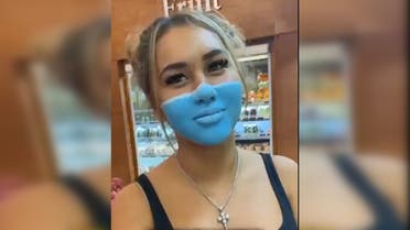 Russian influencer Leia Se appears with a painted surgical mask. (Screengrab)