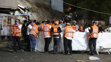 Emergency workers gather at the scene after dozens of people were killed and others injured after a grandstand collapsed in Meron, Israel, where tens of thousands of people were gathered to celebrate the festival of Lag Ba'omer at the site in northern Israel early on April 30, 2021. (File photo: AFP)