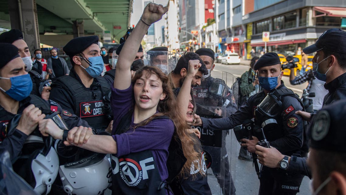 Turkish police detains demonstrators during a May Day rally marking the international day of the worker in Istanbul, on May 1, 2021. (AFP)