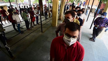 People wait in line to receive a dose of the Covishield coronavirus vaccine, at Tej Bahadur Sapru hospital in Allahabad on May 1, 2021 during the first day of India's vaccination drive to all adults. (Sanjay Kanojia/AFP)People wait in line to receive a dose of the Covishield coronavirus vaccine, at Tej Bahadur Sapru hospital in Allahabad on May 1, 2021 during the first day of India's vaccination drive to all adults. (Sanjay Kanojia/AFP)