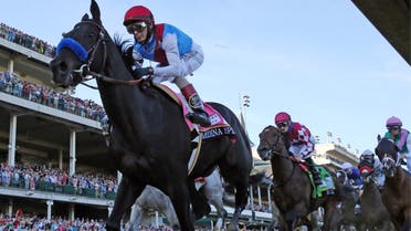 Louisville, Kentucky, USA; John Velazquez guides Medina Spirit to the front of the pack during 147th running of the Kentucky Derby at Churchill Downs. (Jamie Rhodes, USA Today/Reuters)
