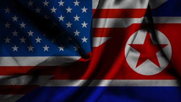 Waving flag of North Korea and USA stock photo