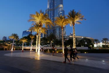 People walk outside the Dubai mall during the holy month of Ramadan in Dubai, United Arab Emirates, April 23, 2021. (File photo: Reuters)