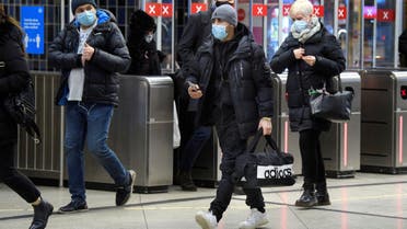 Passengers wearing protective masks enter an underground railway station, amid the spread of the coronavirus disease (COVID-19) pandemic, in Stockholm, Sweden, January 7, 2021. (File Photo: Reuters)