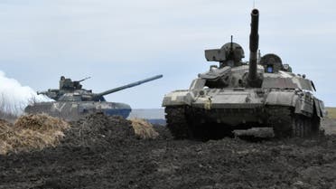 Tanks of the Ukrainian Armed Forces are seen during drills at an unknown location near the border of Russian-annexed Crimea, April 14, 2021. (Reuters)