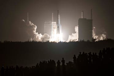 In this file photo a Long March 5B rocket carrying China's Chang'e-5 lunar probe launches from the Wenchang Space Center on China's southern Hainan Island on November 24, 2020, on a mission to bring back lunar rocks, the first attempt by any nation to retrieve samples from the moon in four decades. (File photo: AFP)