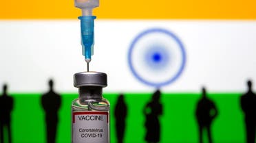 FILE PHOTO: 3D-printed small toy figurines, a syringe and vial labelled coronavirus disease (COVID-19) vaccine are seen in front of India flag in this illustration taken May 4, 2021. (File Photo: Reuters)