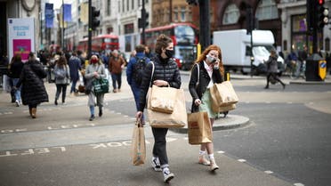 People walk at Oxford Street, as the coronavirus disease (COVID-19) restrictions ease, in London, Britain. (Reuters)