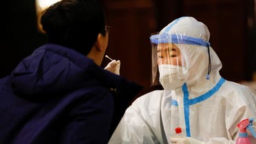 A member of the media gets tested for the coronavirus disease (COVID-19) ahead of the opening session of the Chinese People's Political Consultative Conference (CPPCC) in Beijing, China, March 4, 2021. (File photo: Reuters)