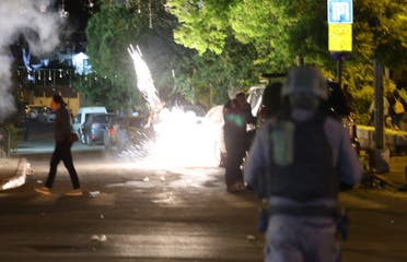 اشتباكات بين الشرطة الإسرائيلية والمتظاهرين الفلسطينيين في حي الشيخ جراح يوم 7 مايو (فرانس برس)