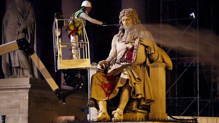 French anti-racism activist on trial for defacing statue