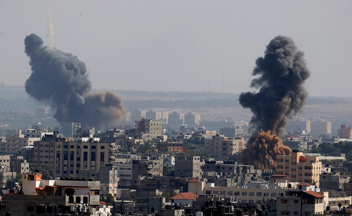 Smoke rises after Israeli airstrikes in Gaza in Gaza City, May 11, 2021. (AP/Hatem Moussa)