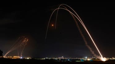 Israel's Iron Dome aerial defence system is launched to intercept a rocket launched from the Gaza Strip, controlled by the Palestinian Hamas movement, above the southern Israeli city of Ashdod, on May 11, 2021.