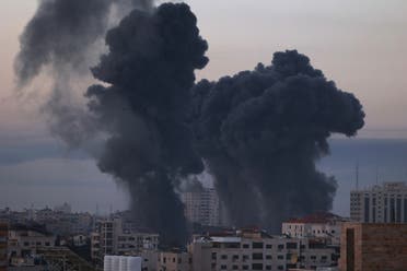 Smoke rises after an Israeli air strike in Gaza City near Barcelona Park and multiple government places, one of the biggest air strikes on the Gaza Strip, early on May 12, 2021. (File photo: AFP)