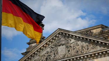 A German flag flutters in front of the Reichstag building in Berlin, Germany, September 6, 2020. Letters read To the German people. Picture taken September 6, 2020. (Reuters)