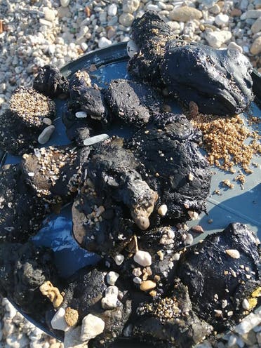 Tar balls washed up close to Tyre. (Image: Hessein Ghaddar)