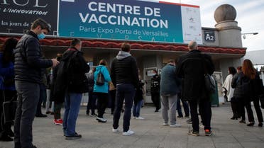 People wait outside a mass vaccination center in Paris, as part of the coronavirus disease (COVID-19) vaccination campaign in France, May 12, 2021. (Reuters)