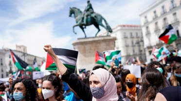 People take part in a protest in support of Palestinians amid their ongoing conflict with Israel, at Puerta del Sol square, in Madrid, Spain May 15, 2021. (Reuters)