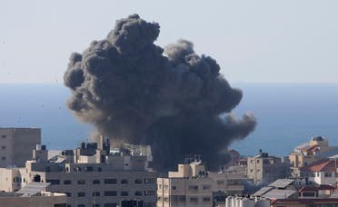 Smoke rises following Israeli airstrikes on a building in Gaza City, Friday, May 14, 2021. (AP)