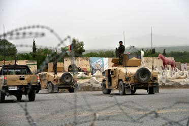 In this file photo taken on April 04, 2021 Afghan security forces stand on Humvee vehicles during a military operation in Arghandab district of Kandahar province. (AFP)