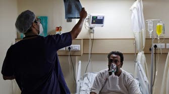 India’s tally of COVID-19 infections crosses 25 million, cyclone complicates efforts