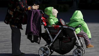 China to ease birth policy but wary of social risks: Sources