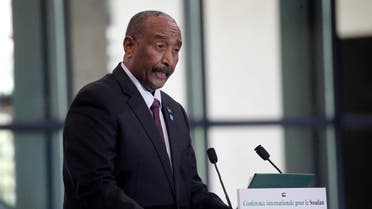 Sudan's President Abdel Fattah Al-Burhan speaks during a session of the international conference on Sudan which aims to provide financing breathing room for its Prime Minister as he pursues economic reforms in Paris on May 17, 2021. (AFP)
