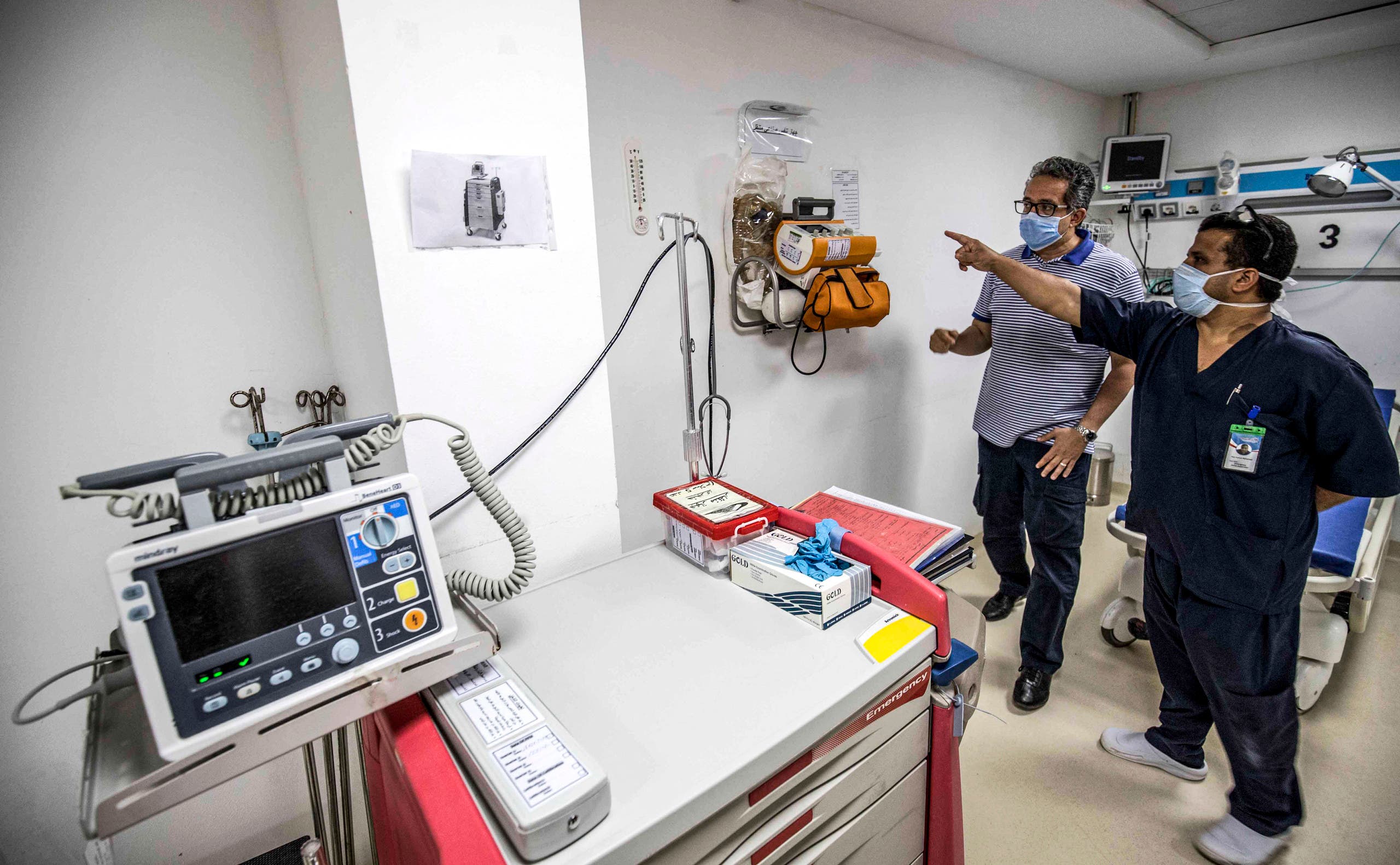 Egypt's Tourism and Antiquities Minister Khaled al-Anani is shown a portable medical ventilator device while being toured by a medical worker at Sharm International Hospital in Egypt's Sinai resort city of Sharm el-Sheikh on June 19, 2020. (File photo: AFP)
